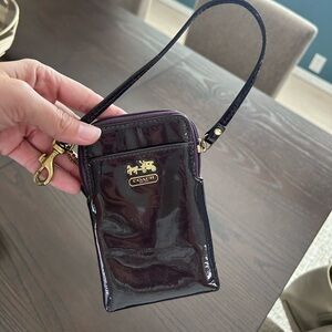 Small purple Coach wristlet